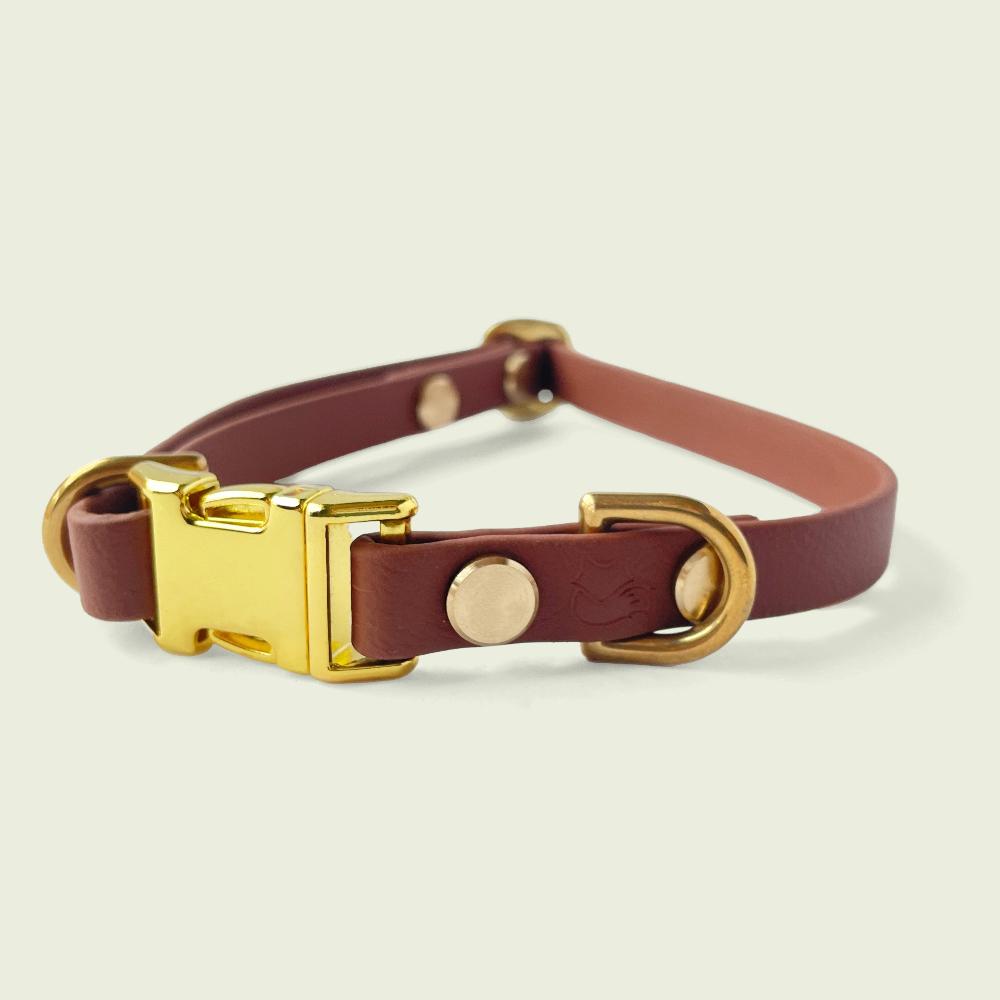 Luxurious medium brown dog collar, 1/2 inch wide, with gold hardware, featuring durable construction and stylish design, perfect for fashionable pets